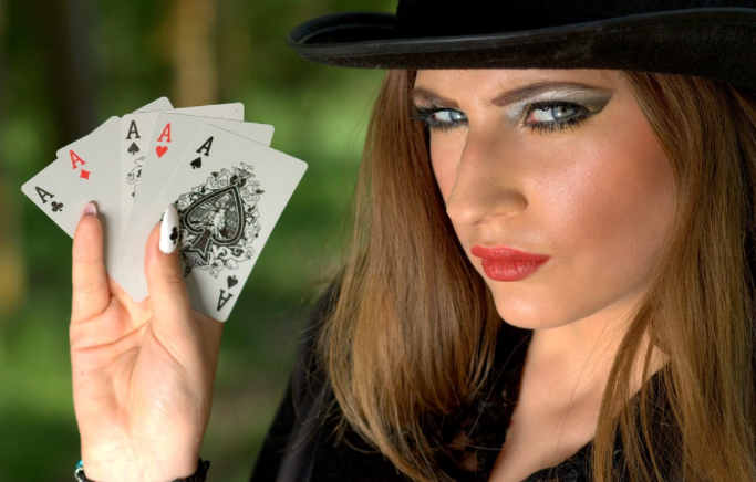 A woman with poker cards